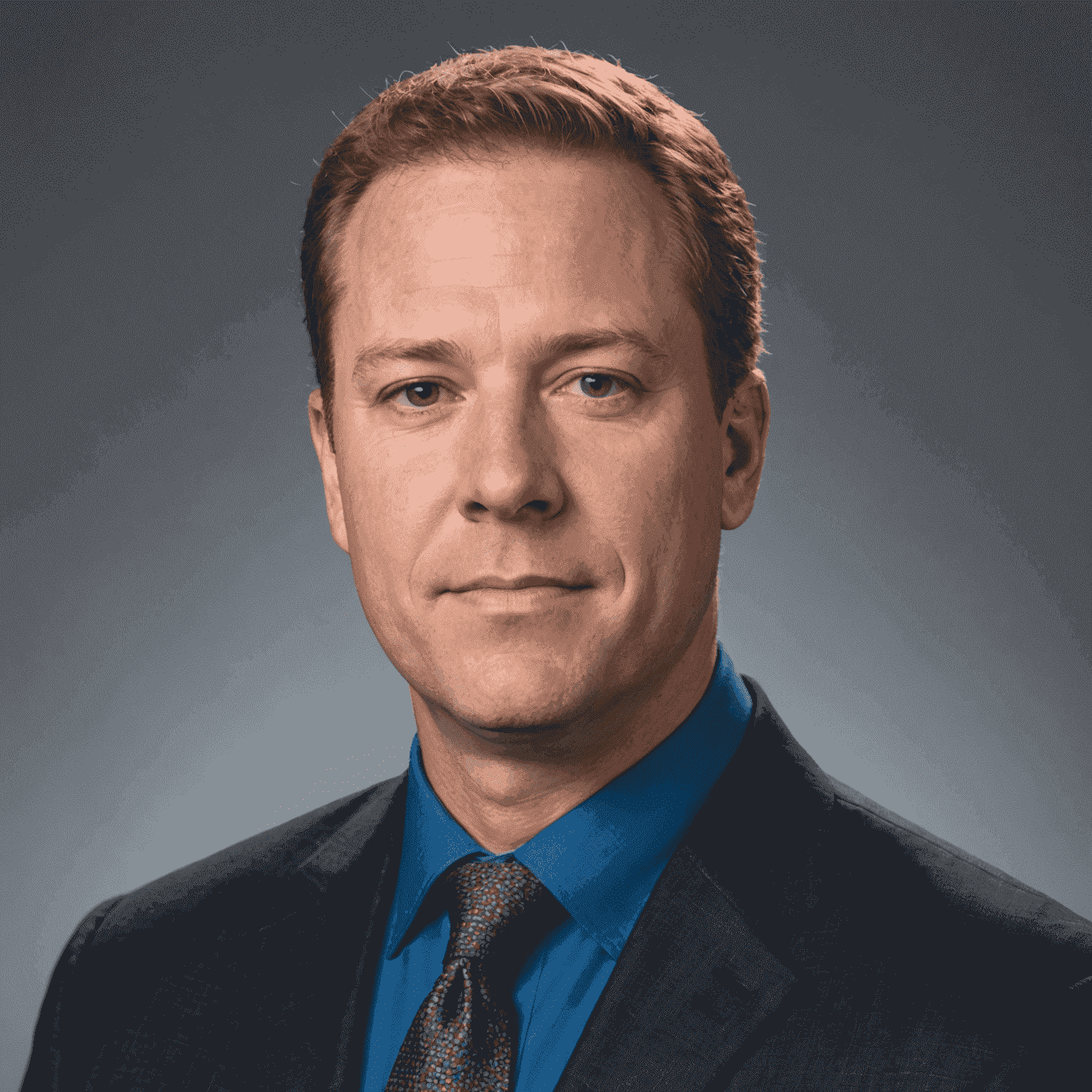 Headshot of Michael Brown, a cybersecurity expert with extensive experience in protecting digital assets